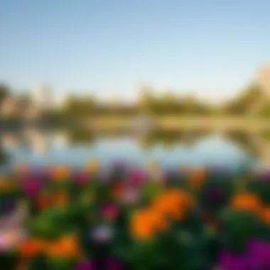 Serene Lake in Zabeel Park A serene lake within Zabeel Park surrounded by vibrant flowers and greenery.